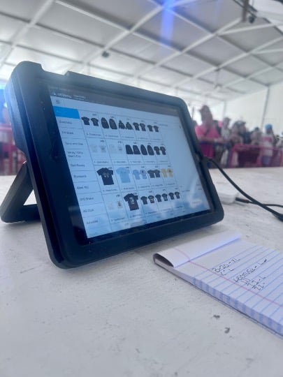 coachella atvenu register ipad at merch stand